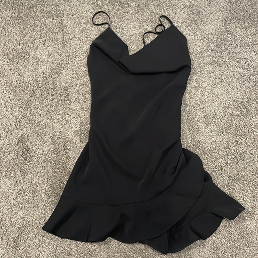 She + Sky black cowl neck cross back romper.